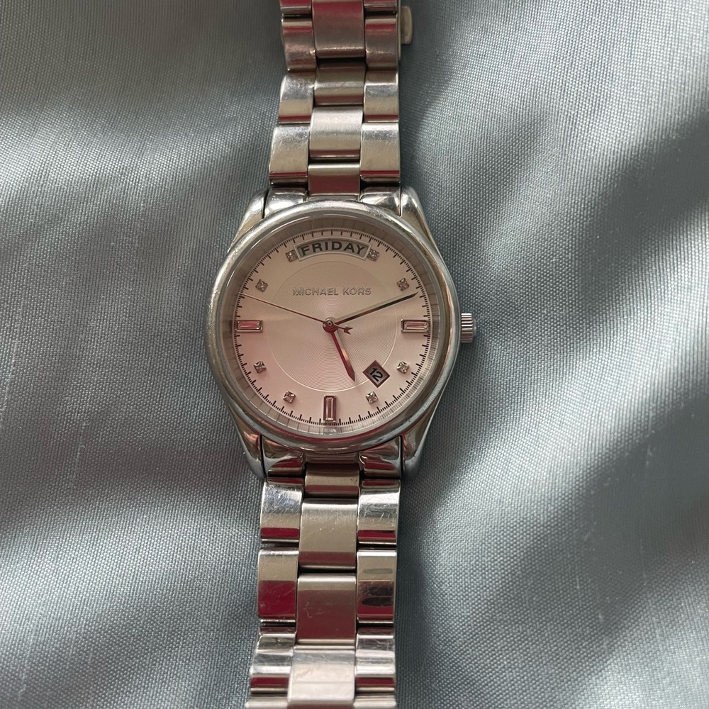 Michael Kors watch. Needs battery. Works nicely.